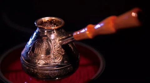 Coffee in the Turk on a plate Stock Footage 68593914