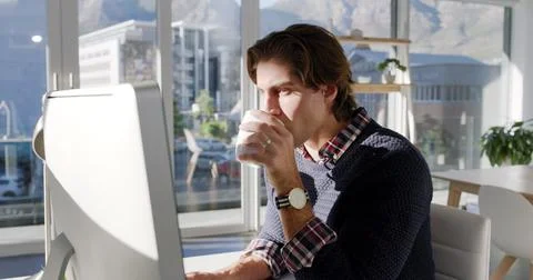 Coffee, web designer or man on computer for research for creative website and Stockfoto's