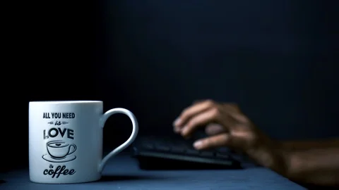 Coffee while typing and working Stock Footage 121347333