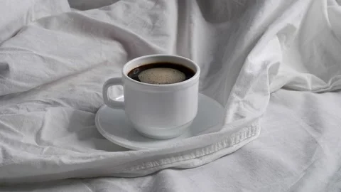 Coffee in a white bed. Interior. Cosiness. Stock Footage 157832427