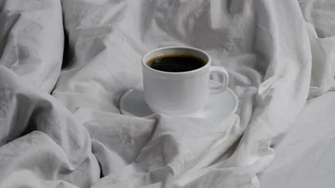 Coffee in a white bed. Interior. Cosiness. Stock Footage 158016741