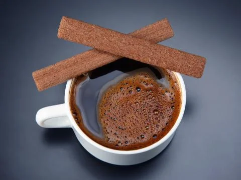 Coffee in white Cup on dark background with cookies Stock-Fotos