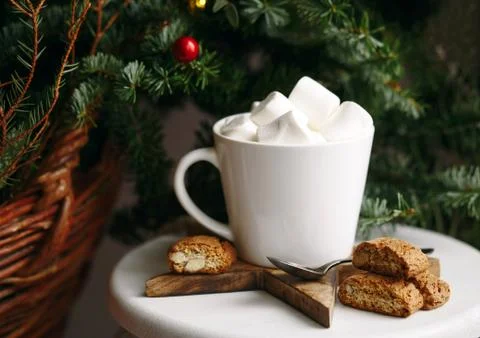 Coffee in a white cup with marshmallows. Morning festive coffee with traditio Stock Photos