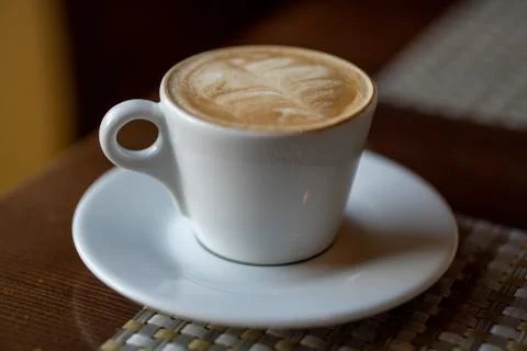 Coffee in a white cup on the table. Stock-Fotos