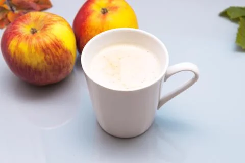 Coffee in a white mug on a blue background Stock Photos
