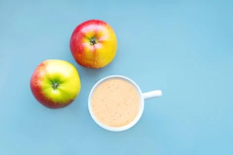 Coffee in a white mug on a blue background Stock Photos