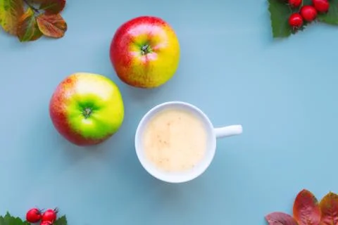 Coffee in a white mug on a blue background Stock Photos