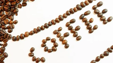 Coffee word lined with coffee beans on a white background. Stock Footage 121003291