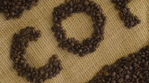 Coffee word lined with coffee beans Stock Footage 137029715