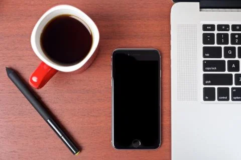 Coffee work table with mobile devices top view Foto stock