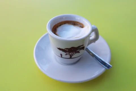 Coffeecup on a green table 스톡 사진