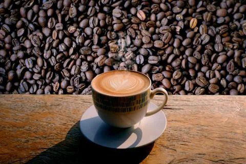 Coffeecupandbeans Stock Photos