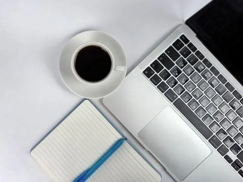 A coffeeinspired laptop setup designed specifically for enhancing productiv.. Stock Photos