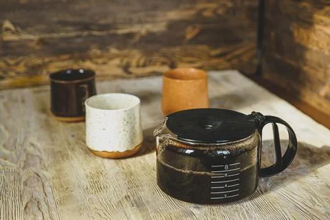 Coffepot and three cups Stock-Fotos