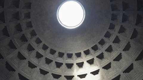 Coffered dome surrounds bright round skylight in quiet architectural interior Stock Footage 348425754