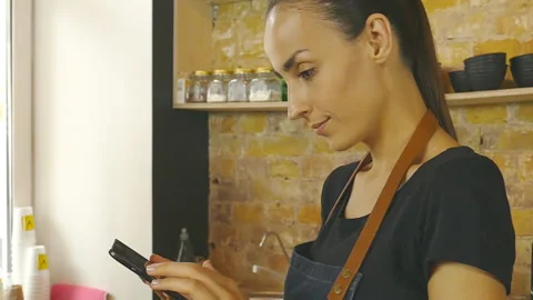 Cofffeeshop worker with ipad. Slow motion. Stock Footage 96742395