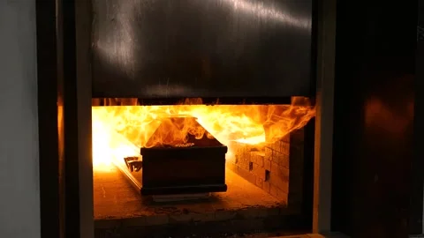 The coffin with the body is burned in the crematorium Stock Footage 306492889