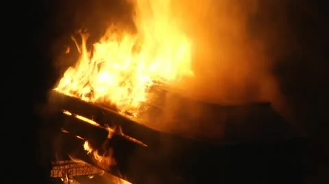 Coffin burns at night Stock Footage 12332494