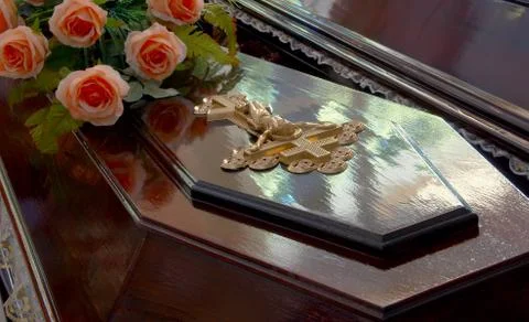Coffin with holy cross Stock Photos