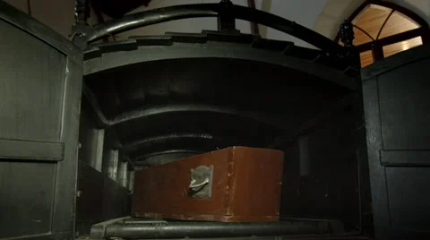 Coffin in old fashioned hearse Stock Footage 38824063