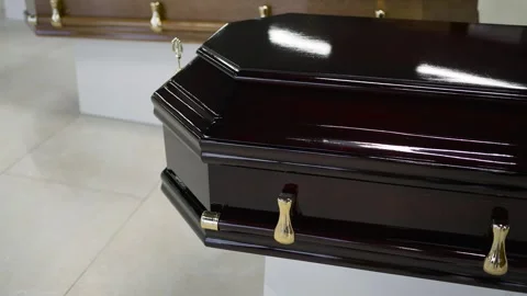 The coffin of the permium in the field office, close-up. The concept of death Stock Footage 292923002