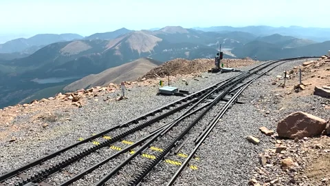 Cog railway tracks on Pikes Peak featuring a critical switch mechanism in high Stock Footage 328088348