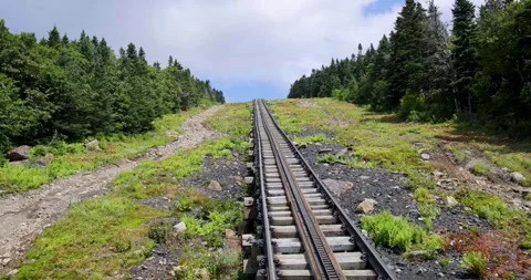 A cog railway train going up a steep part Stock Footage 251042349