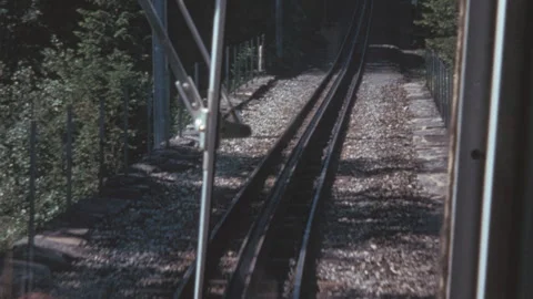 Cog Railway Train POV Ascending Forest Switzerland 1950s Vídeo Stock 342604450