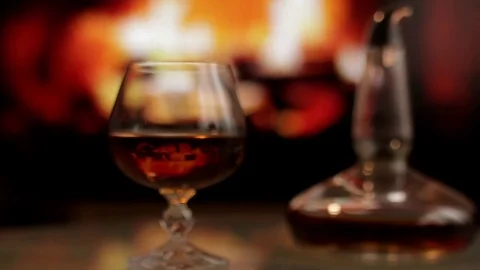 Cognac and fireplace Stock Footage 72158026