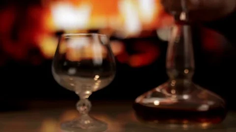 Cognac and fireplace Stock Footage 72158043