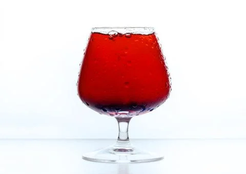 Cognac glass with water drops Stock Photos
