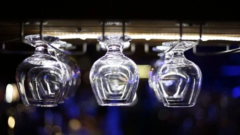 Cognac glasses over the bar Stock Footage 90864928
