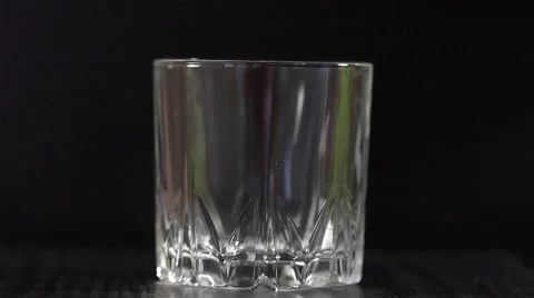 Cognac with ice 2 Stock-Footage 58899636