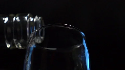 Cognac is poured into a stack Stock Footage 119283046