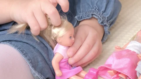 Cognitive Development Through Play, close-up of children's hands with toys,.. Stock Footage 250169937