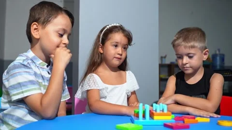 Cognitive Development for young minds. Preschoolers tackle logical puzzles Stock Footage 259156142
