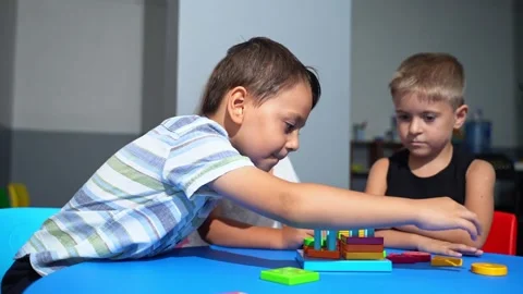 Cognitive Development for young minds. Preschoolers tackle logical puzzles Stock Footage 259825977