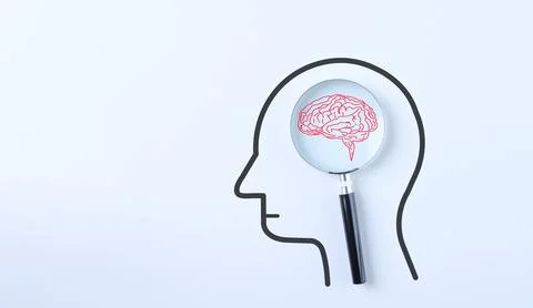 Cognitive problem and brain diseases concept. Magnifying glass focus human Stock Photos