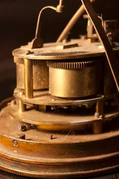 Cogs and gears of an old clock Stock Photos