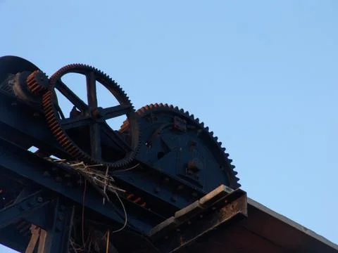 Cogs big structure standing against the blue sky in Tel Aviv port, Israel Foto stock