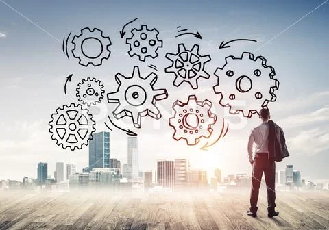 Cogwheel engine drawn on screen as symbol for teamwork and coope Stock Photos
