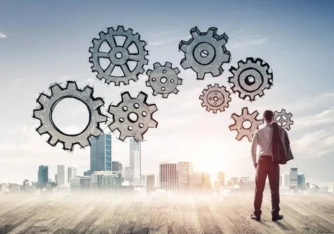 Cogwheel engine drawn on screen as symbol for teamwork and cooperation Bac... Foto stock