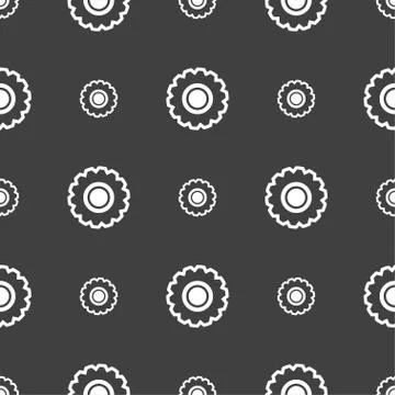 Cogwheel icon sign. Seamless pattern on a gray background. Stock Illustration