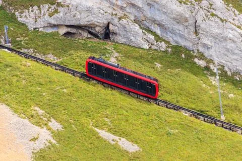 Cogwheel train climbing to the top of Mount Pilatus in Canton Lucerne Stock Photos