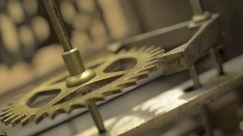 Cogwheels inside an old pendulum clock. Seamless looping Stock Footage 74723611