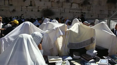 Cohanim raise their hands during Priestly Blessing at the Western Wall Stock Footage 22305133
