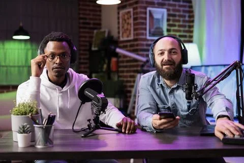 Cohosts presenting entertaining show Stock Photos
