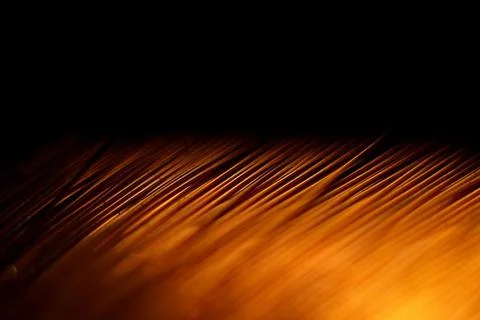 A coil of copper wire on a black background Stock Photos