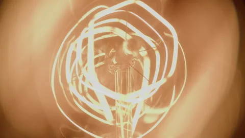 Coil Lighting up from Dark to Bright Light Stock Footage 270396567