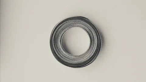 Coil of paper rotating stop motion Stock Footage 80899660